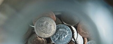 Money at the bottom of a jar