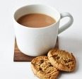 Coffee cup and biscuit