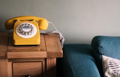 Telephone by a settee