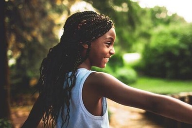 Girl in a park in the sunshine