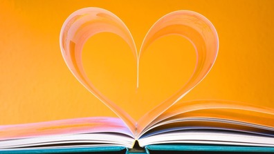 Book pages forming a heart