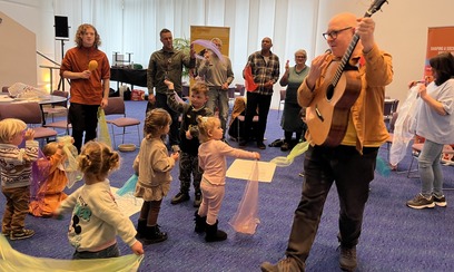 People of different ages having creative fun together