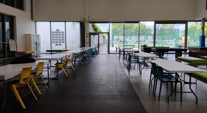 Interior of Manchester Youth Zone with tables laid out