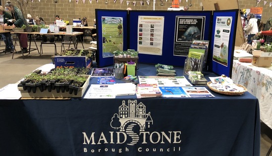stall with MBC table cloth, information leaflets and plant giveaways 