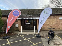 flags outside repair cafe building