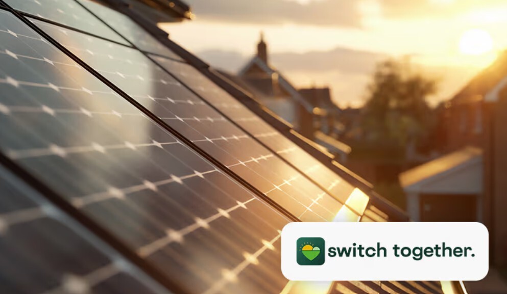 Solar panels on a roof with Switch Together logo