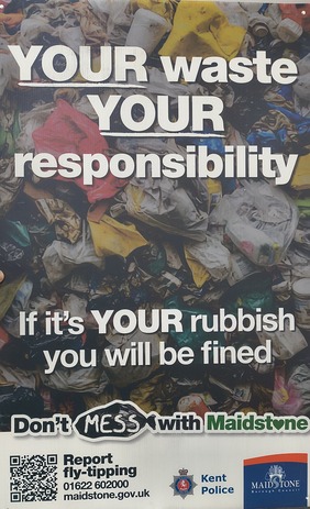 Picture of a warning flytipping poster placed at locations around the borough