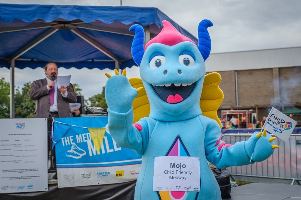 Mojo, the Child-Friendly Medway Mascot, waving 'hello'