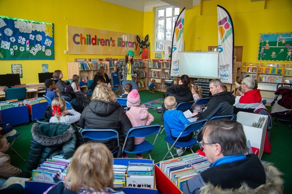 Children and families listening to author Sam Gayton at our Gillingham Community Hub and Library World Book Day Celebration 