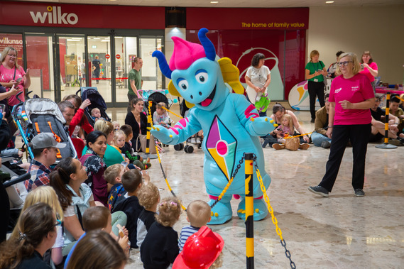 Our Child-Friendly Medway mascot, Mojo, saying hello to children, young people, and families at our Dino Day.