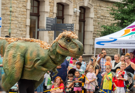 Children watching the dinosaur shows at Dino Day