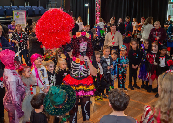 Entertainer playing games with children and young people at our Trick or Treat event