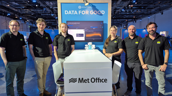 Met Office team at the Snowflake World Tour London event stand.