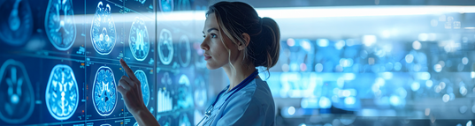 DMHT Banner Dr looking at brain scans copy