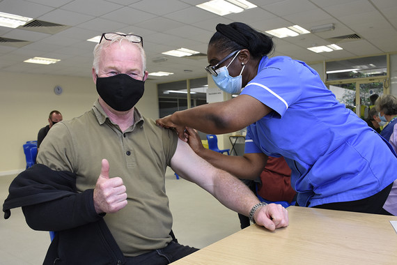 Image of someone getting their COVID-19 vaccination