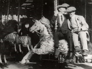 People on merry go round