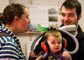 Child taking part on an experiment with parents