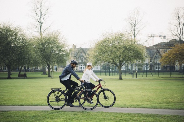 Two people cycling