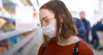 Woman wearing a mask in supermarket