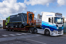 Electric bin lorry being delivered