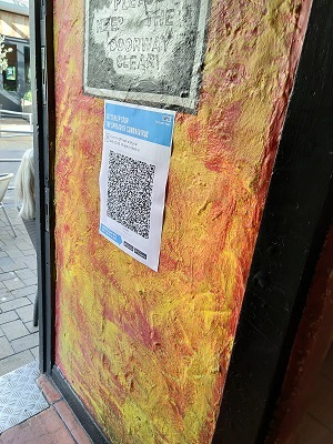 QR code at entrance to a business