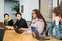 People meeting around a table in theoffice