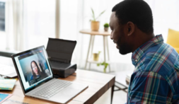 male looking at laptop