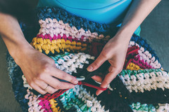 Person knitting blanket