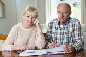 Couple looking at bills