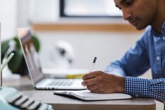 Man at desk with computer