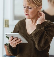 Woman looking at tablet device