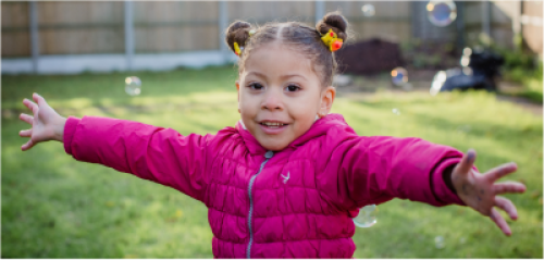 Girl with outstretched arms