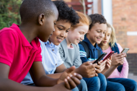 Children sitting next to each other