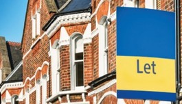 Terraced houses with letting sign