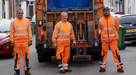 Bin crew standing in front of lorry