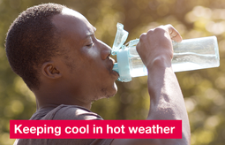 Man drinking water in hot weather