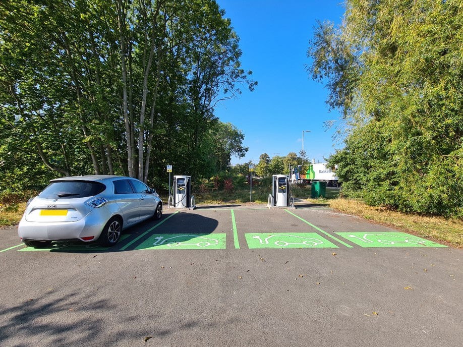 Electric car being charged