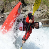 Man in Canoe an action shot to promote the ICF Freestyle championships 2022