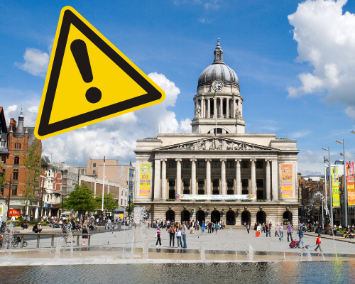 Council House with warning sign