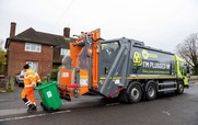 Binman and electric bin lorry