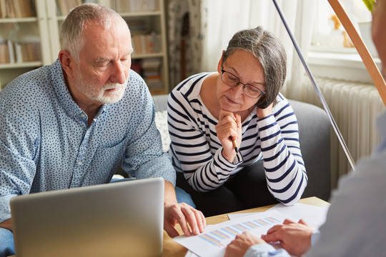 couple looking at computer together.