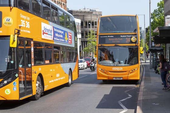Two buses in a bus lane