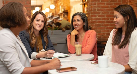 BIPC Women's Network - Women gathered around a table