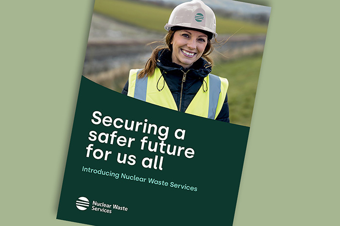 Front cover of launch brochure showing female employee with new NWS branded workwear