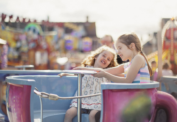 Girls on teacup ride