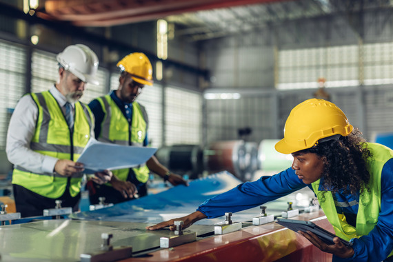 Machine operative checking outcome of manufactured product