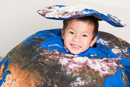 boy dressed as the Earth