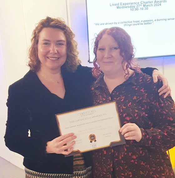 Picture of Emma and Emily showing certificate 