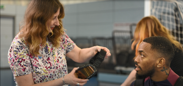 Picture showing Sharon Parsons talking to Ivan Toney