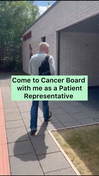 A male walking into a building with the words come with me to a cancer board as a patient representative